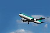 foto of blue sky  - airplane on blue sky go to vacations - JPG 