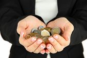 image of investment  - Woman hands with coins isolated on white - JPG 