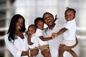 stock photo of inside  - African American family together inside their home - JPG 