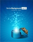 pic of gift  - Open explore gift with fly snowflakes vector background - JPG 