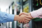 pic of handshake  - group of young business people it engineer in network server room solving problems and give help and support - JPG 