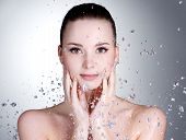 pic of face  - Portrait of beautiful young woman with drops of water around her face  - JPG 