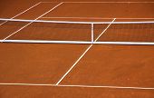 stock photo of time  - Empty clay tennis court during game time - JPG 