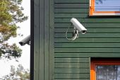 image of security  - two security cameras on the building walls - JPG 