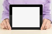 foto of businessmen  - Businessman holding and showing blank digital tablet pc - JPG 