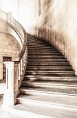 stock photo of interior  - Marble winding staircase with high solid handrails in hall leading up - JPG 