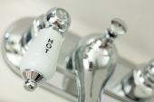 foto of seep  - Abstract of Classic Chrome Hot Sink Faucet Knob - JPG 