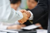 pic of handshake  - Handshake between employee and boss to ilustrate he is being accepted in the team - JPG 