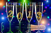 stock photo of  photo  - bottle champagne with four glass goblet and numeral 2013 beautiful celebrations New Year concept photo - JPG 