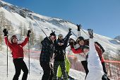 image of france  - happy people group have fun on ski snow at winter season on mountain with blue sky and fresh air - JPG 