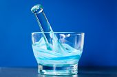 picture of blue  - A glass mortar and pestle with a mixture of blue and white compounds - JPG 
