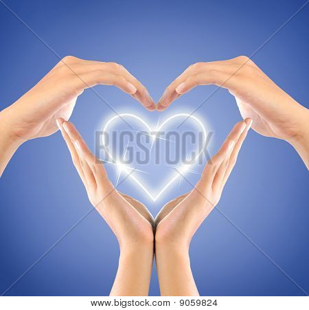 Stock photo : love symbol made by hands