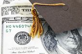 pic of money  - a mini graduation cap on money bills - JPG 