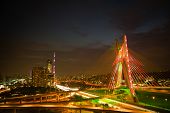 stock photo of bridge  - Most famous bridge in the city at night Octavio Frias De Oliveira Bridge Pinheiros River Sao Paulo Brazil - JPG 