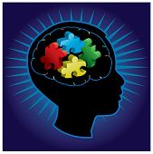 stock photo of puzzle  - Black silhouette of profiled child with symbolic autism puzzle pieces - JPG 