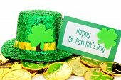 stock photo of holidays  - Happy St Patricks Day tag with party hat and gold coins over white - JPG 