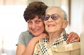 foto of laughter  - Happy woman with elderly mother laughing together - JPG 
