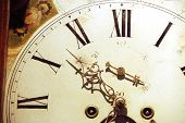 image of clockface  - Detail of the clockface of an old longcase clock - JPG 