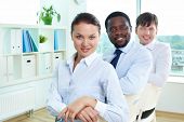 image of team  - Portrait of successful business team with pretty leader in front - JPG 