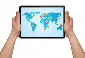 stock photo of map  - a male hand holding a modern  touchpad with social map - JPG 