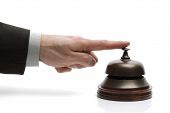 pic of reception  - Businessman ringing a hotel reception service bell to request assistance - JPG 