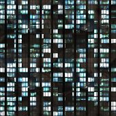 image of buildings  - Seamless illustration resembling illuminated windows in a tall building at night - JPG 