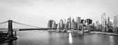 pic of bridge  - New York City skyline with  Brooklyn Bridge and  Lower Manhattan view in early morning sun light  - JPG 