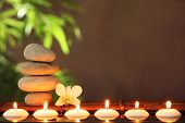 picture of health  - Stack of zen stones and aromatic candles on table - JPG 
