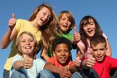 stock photo of children  - group of diverse kids or children with thumbs up - JPG 