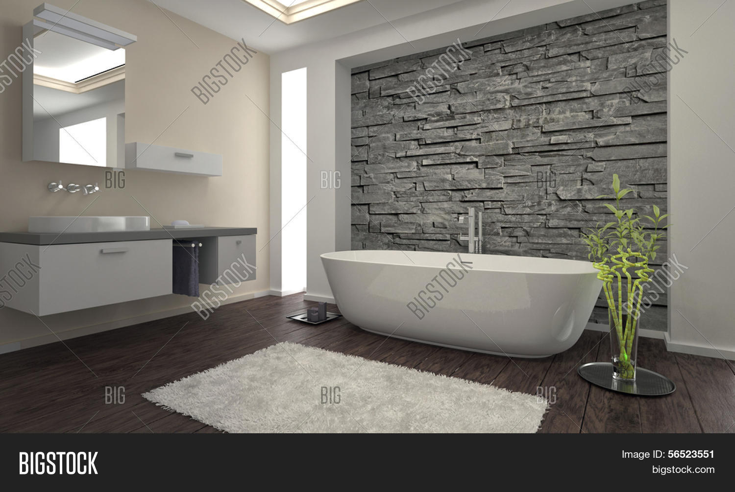 Salle de bains design moderne avec baignoire et mur de pierre ...