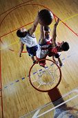 picture of sports  - young healthy man play basketball game indoor in sport gym
 - JPG 