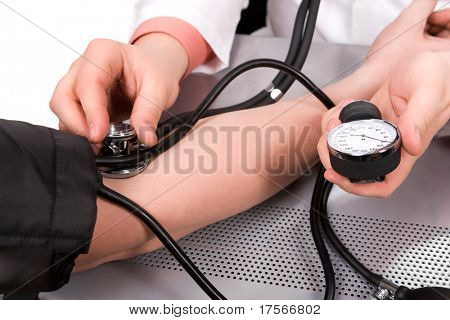 Picture or Photo of Doctor checking blood pressure with stethoscope and sphygmomanometer