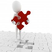 stock photo of puzzle  - 3d man holding a puzzle piece - JPG 