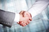 pic of handshake  - Image of handshaking of business partners - JPG 
