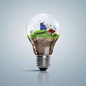 picture of nature  - Ecoloy illustration Lamp bulb with clean nature and renewable energy symbol inside - JPG 