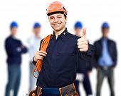 picture of group  - Portrait of an happy worker in front of his team - JPG 