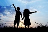 picture of brothers  - Little brother and sister silhouette - JPG 