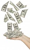 foto of money  - Many dollars falling on womans hand with money - JPG 