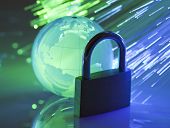 stock photo of globe  - Padlock with crystal globe - JPG 