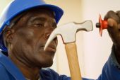 pic of construction worker  - African American Construction Worker with Hammer in Hand - JPG 