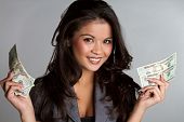 stock photo of money  - Beautiful happy smiling business woman holding money - JPG 