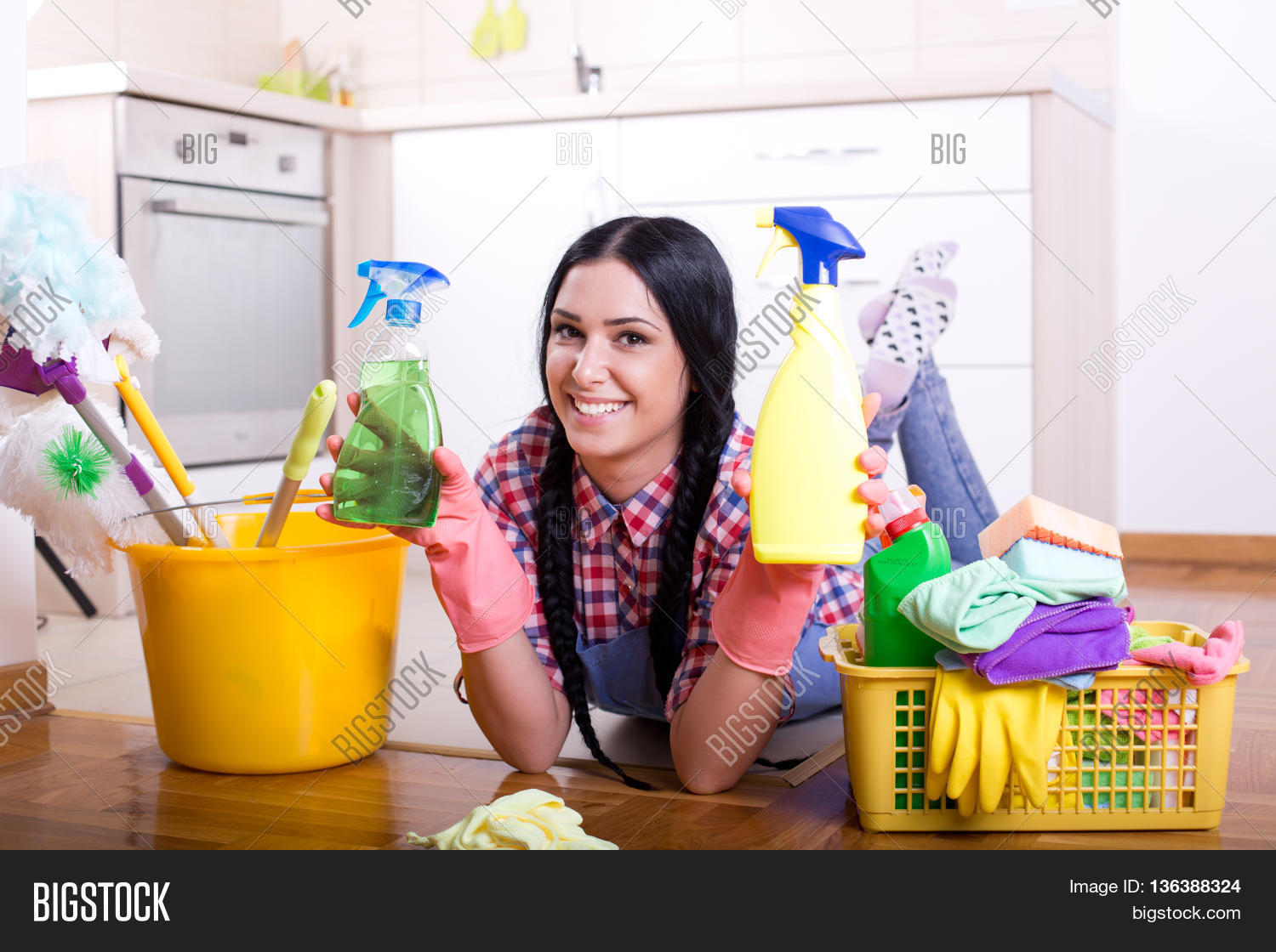 Girl Showing Spray Bottles In Kitchen Stock Photo & Stock Images Bigstock