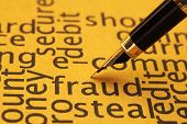 stock photo of fraud  - Close up of fountain pen on Fraud - JPG 