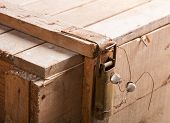 stock photo of latch  - Closeup of metal latch with seal on old wooden chest - JPG 