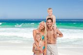 stock photo of beach  - Happy family on the beach - JPG 