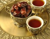 picture of religion  - A golden bowl of dates and tea - JPG 