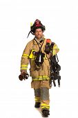 stock photo of walking  - Firefighter holding mask and airpack fully protective suit walking on isolated white background - JPG 