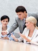 image of teamwork  - Business people discuss something at the conference at the modern office building - JPG 