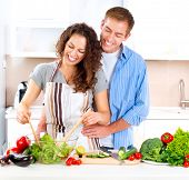 stock photo of food  - Happy Couple Cooking Together  - JPG 