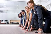 picture of business people  - Group of people ready to race in an office - JPG 